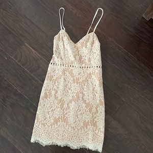 Lace bridal shower dress with cutouts and scalloped hem